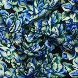 Satin polyester imprimé fleur jaune, verte et bleue fond noir
