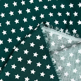 Algodón estampado estrellas 1cm verde bosque