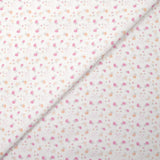 Piqué de coton imprimé fleurs et coeurs rose et orange fond blanc