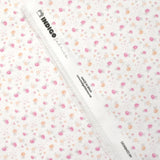 Piqué de coton imprimé fleurs et coeurs rose et orange fond blanc