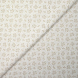 Piqué de coton imprimé brindille dans le vent beige fond blanc