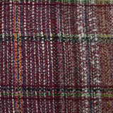 Capucine wool blend tweed green and black line wine background