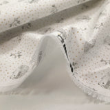 Piqué de coton imprimé hérisson et pois taupe fond blanc