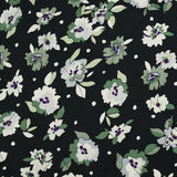 Viscose matelassée fleurs vertes fond bleu nuit envers noir