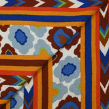Viscose gaufrée imprimée aztèques bleu roi, brique et blanc