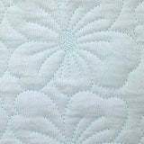 Double gaze matelassée fleurs bleu layette