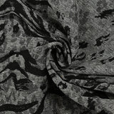 Jacquard de laine mélangée érosion animale noir et gris