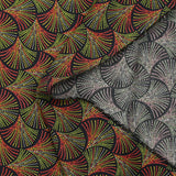 Peacock printed viscose in red, yellow and green dotted black background