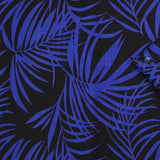 Viscosa estampada de hojas tropicales en azul royal con fondo negro