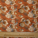 Viscose imprimée chrysanthèmes fond orange brûlé