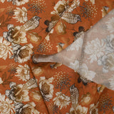 Viscose imprimée chrysanthèmes fond orange brûlé