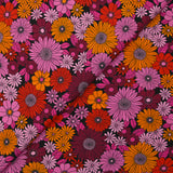 Viscose printed sixties flowers in red, plum and orchid