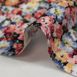 Viscose printed with bluish gray heather and wine lee black background