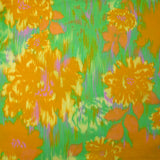 Viscose satin printed mustard floral mist green background