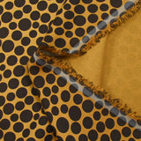 Crêpe viscose et soie imprimé pois fond ocre
