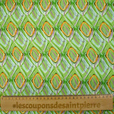 Viscose satin with retro disco green background print