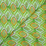 Viscose satin with retro disco green background print