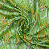 Viscose satin with retro disco green background print