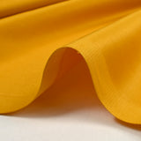 Popeline de coton satinée jaune soleil