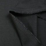 Fantasy wool blend suit fabric anthracite black background
