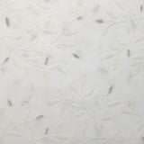 Crêpe georgette floqué paillettes argentées fond blanc