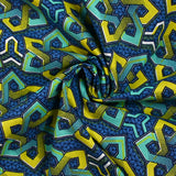 Coton imprimé ethnique Schagen fond bleu jean