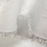 Crêpe georgette floqué paillettes argentées fond blanc
