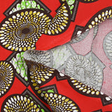 Coton imprimé ethnique Beilen fond rouge