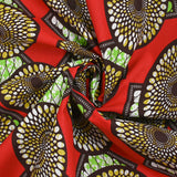 Coton imprimé ethnique Beilen fond rouge