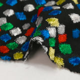 Maille velours confettis en carnaval fond noir