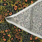 Viscose imprimée léopard orange fluo fond kaki