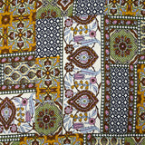 Estampado patchwork de raso de viscosa con adornos en marrón, verde manzana y ocre