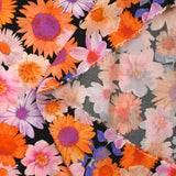 Viscose imprimée invasion florale fond noir