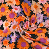 Viscose imprimée invasion florale fond noir