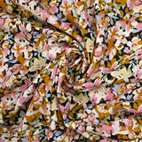 Viscose printed with mustard, pink and baby blue Ornella flowers
