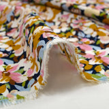 Viscose printed with mustard, pink and baby blue Ornella flowers
