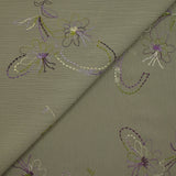 Mousseline crinkle fleurs brodées fond sauge