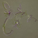 Mousseline crinkle fleurs brodées fond sauge