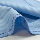 Cotton linen striped golden Lurex sky blue background