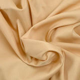 Crêpe polyester élasthanne sable doré