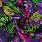 Coton imprimé jungle florale violet fond bleu nuit