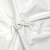 Tela de sastrería de poliéster blanco.