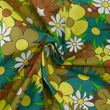 Coton imprimé floraison disco turquoise, marron et jaune beurre
