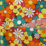 Coton imprimé floraison disco rouge, orange et turquoise