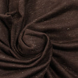 Fine iridescent golden wool knit with brown background