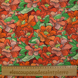 Coton imprimé constellation florale orange