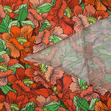 Coton imprimé constellation florale orange
