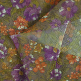 Maille polyester lamée fleurs violet et orange fond marron