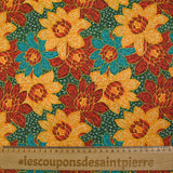 Cotton printed with winter shine, pine green background