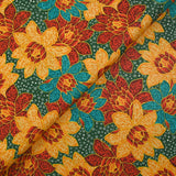 Cotton printed with winter shine, pine green background